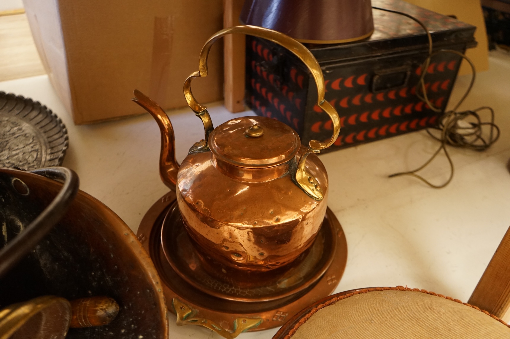 Assorted Victorian and later copper and brassware including two ships portholes, copper kettle pots, etc (16). Large porthole 36cm diameter
